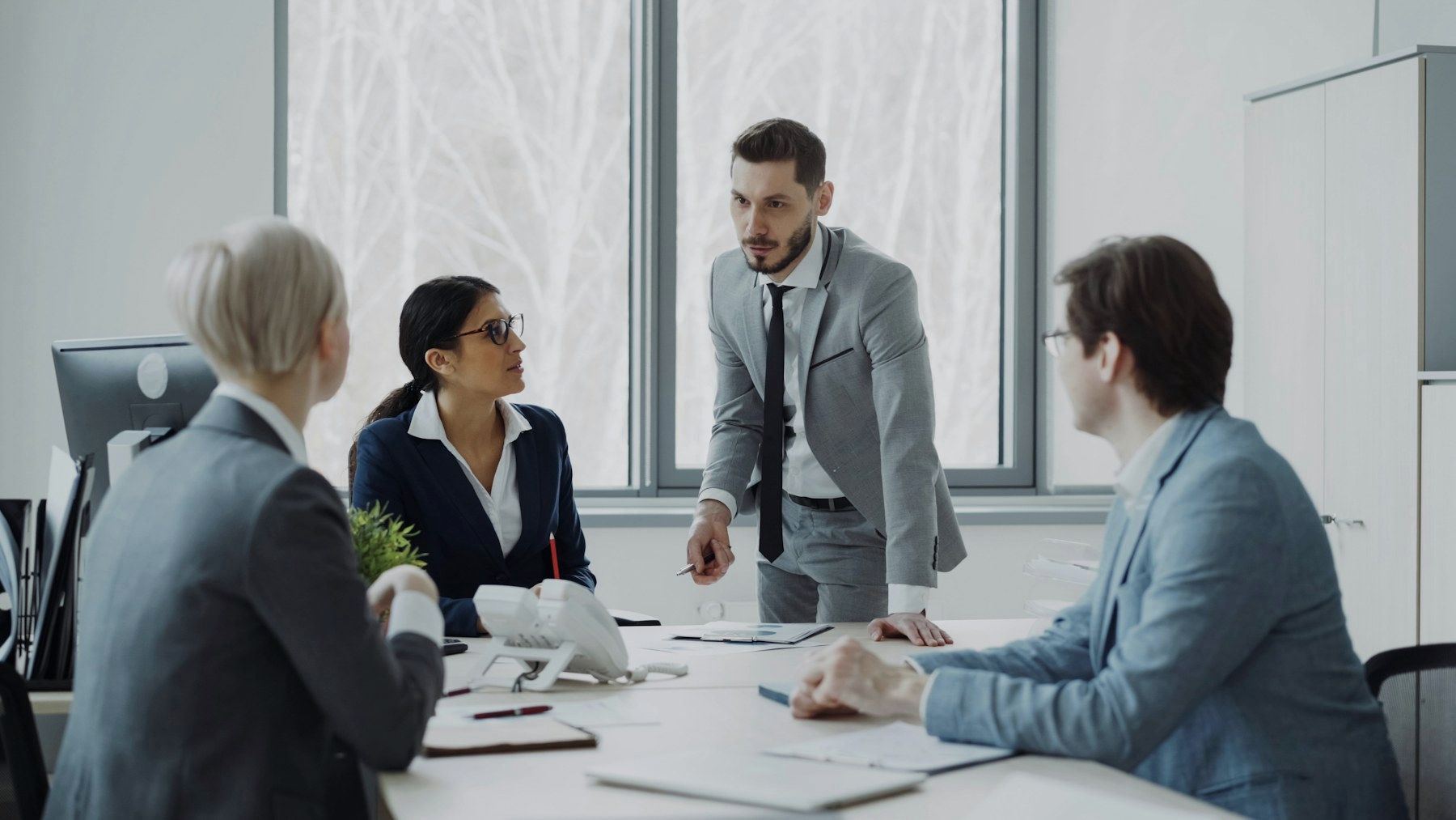 Executives in a boardroom meeting