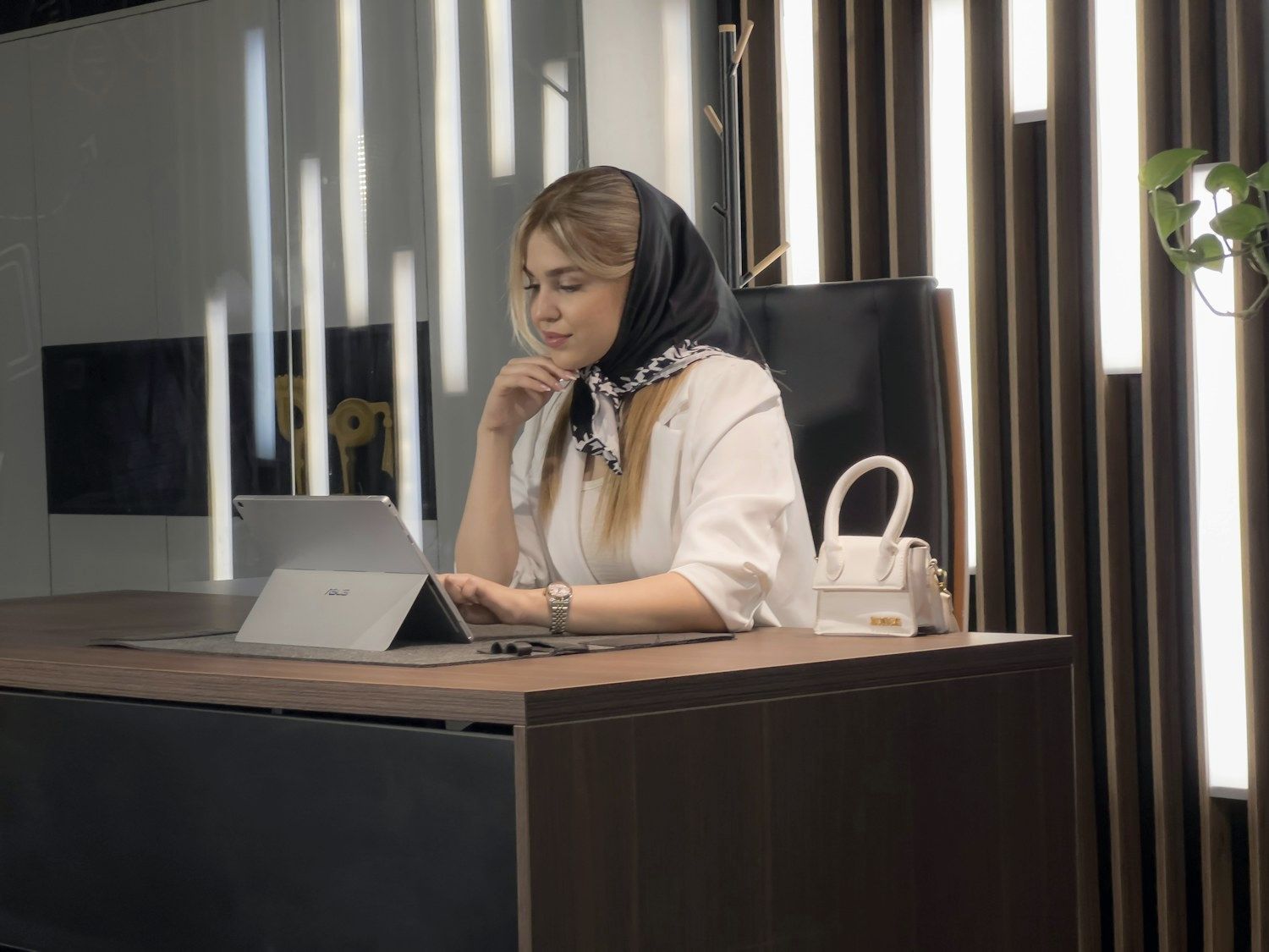 A professional working at her desk